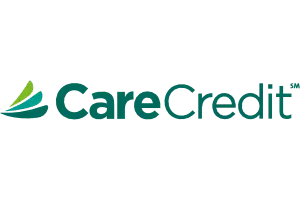The image displays a logo with text that reads  CareCredit  accompanied by a stylized graphic element resembling a leaf or a small tree.